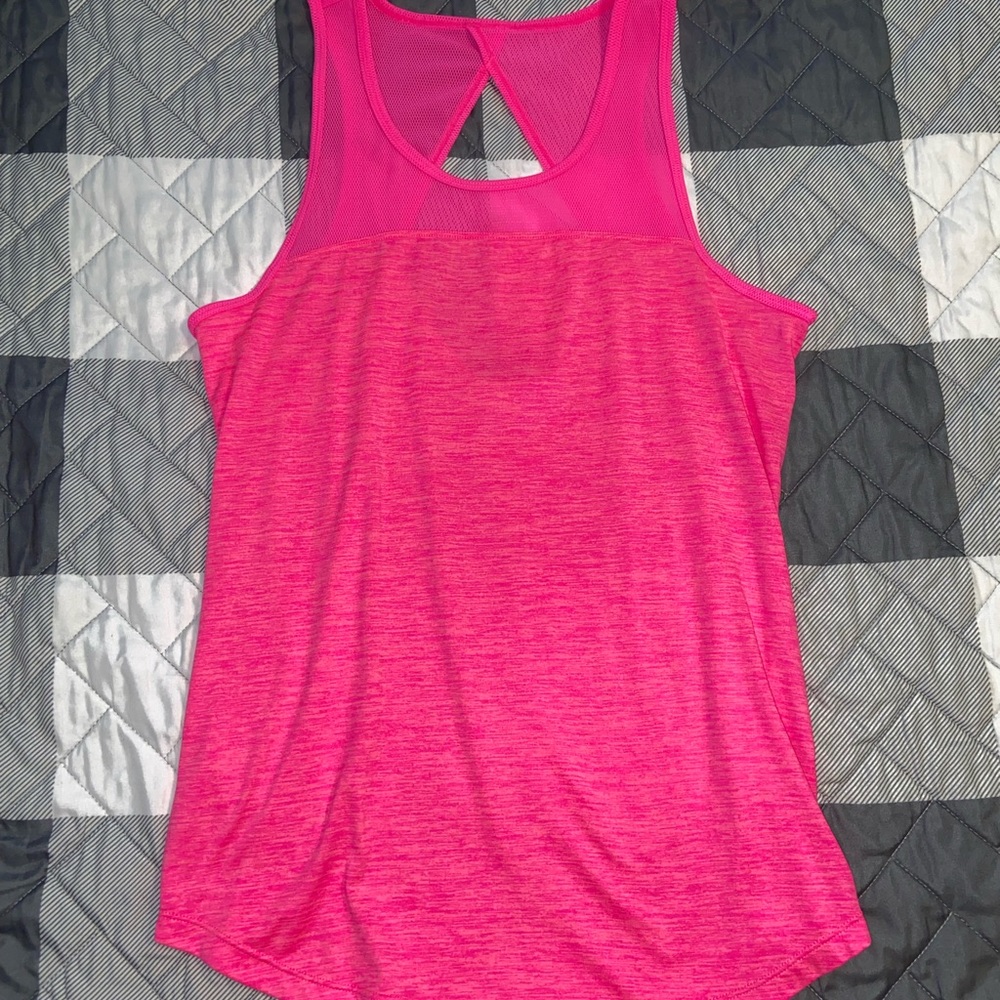 Bright pink Reebok athletic tank top